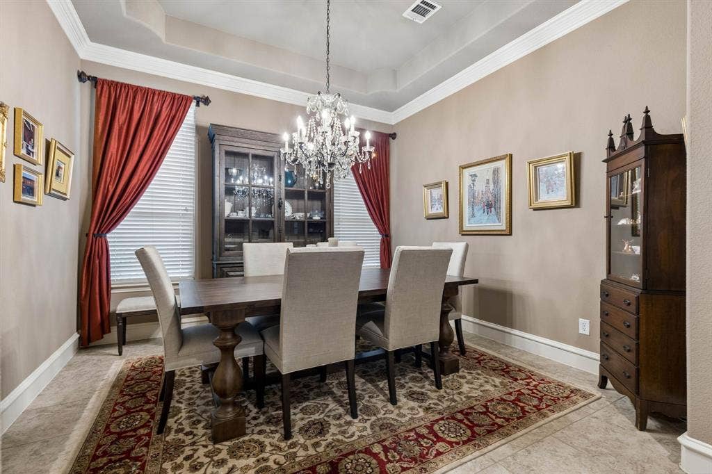 6009 Heron Bay Lane, McKinney, TX 75070 Formal dining is elegant and seats 8-10 comfortably.
