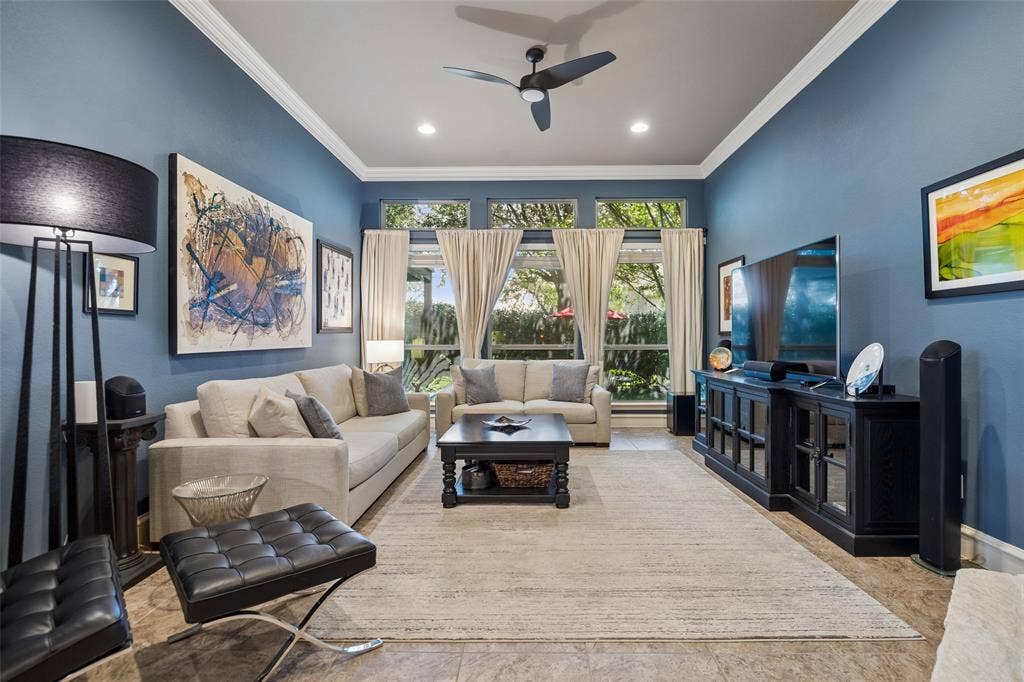 6009 Heron Bay Lane, McKinney, TX 75070 Large family/living area overlooking the backyard .