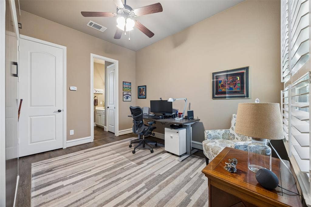 6009 Heron Bay Lane, McKinney, TX 75070 There is ample space when the murphy bed is retracted to the wall.