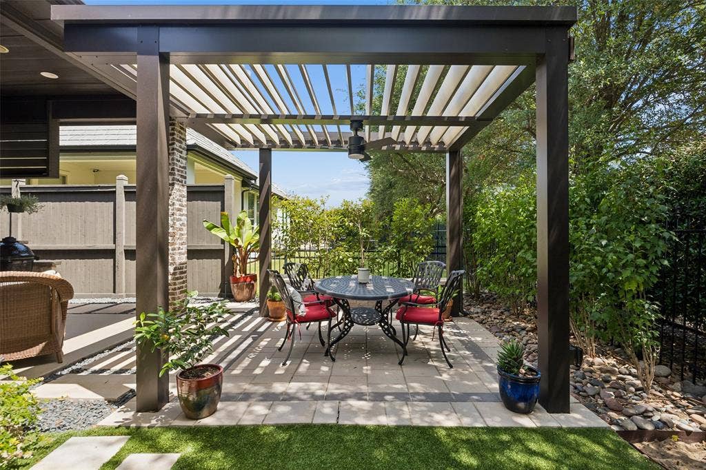 6009 Heron Bay Lane, McKinney, TX 75070 Low maintenance motorized, lighted pergola.