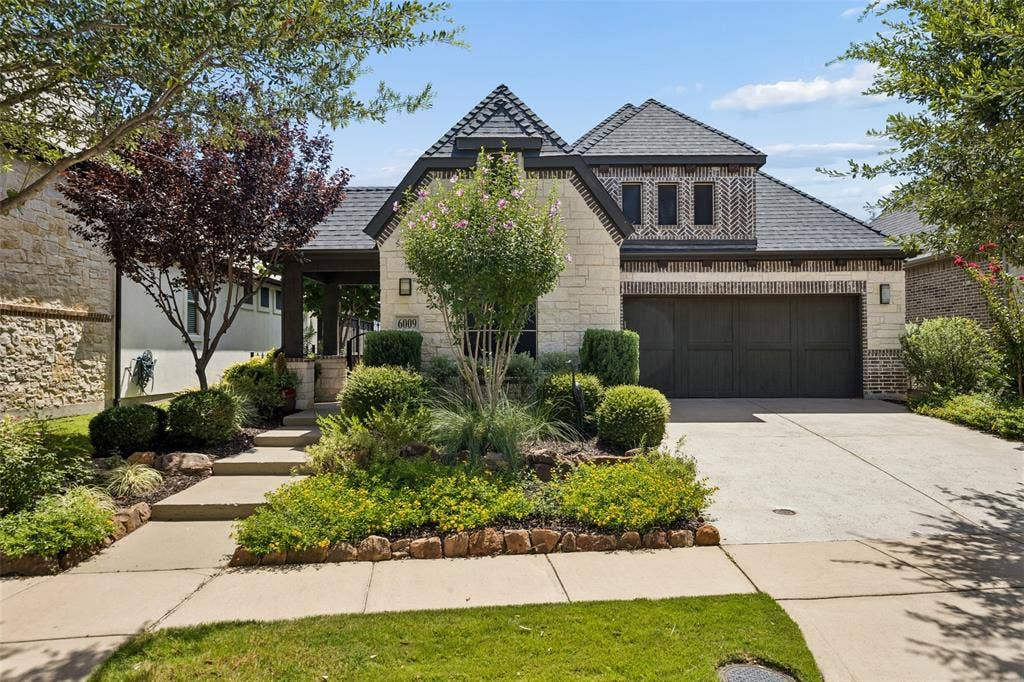 6009 Heron Bay Lane, McKinney, TX 75070 The HOA maintains the front yard lawn care.