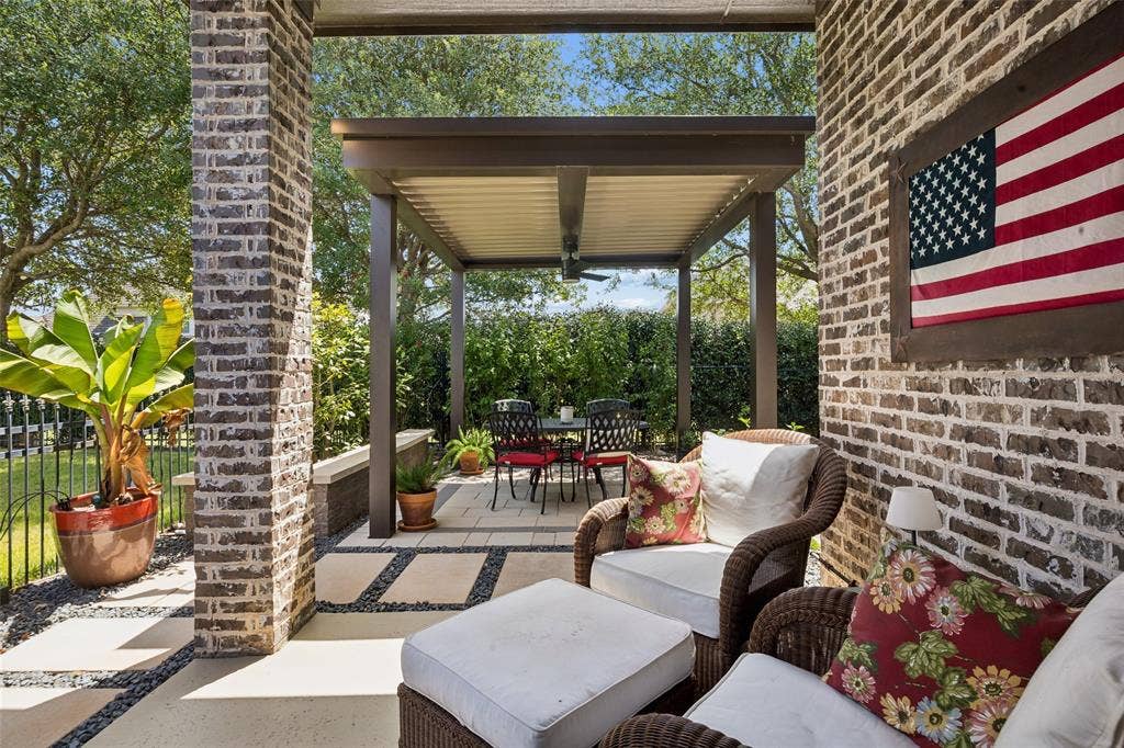 6009 Heron Bay Lane, McKinney, TX 75070 Backyard retreat has several sitting areas.