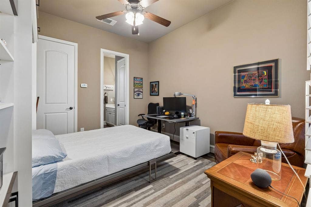 6009 Heron Bay Lane, McKinney, TX 75070 Secondary bedroom has a custom built murphy bed that offers flexibility of the room.
