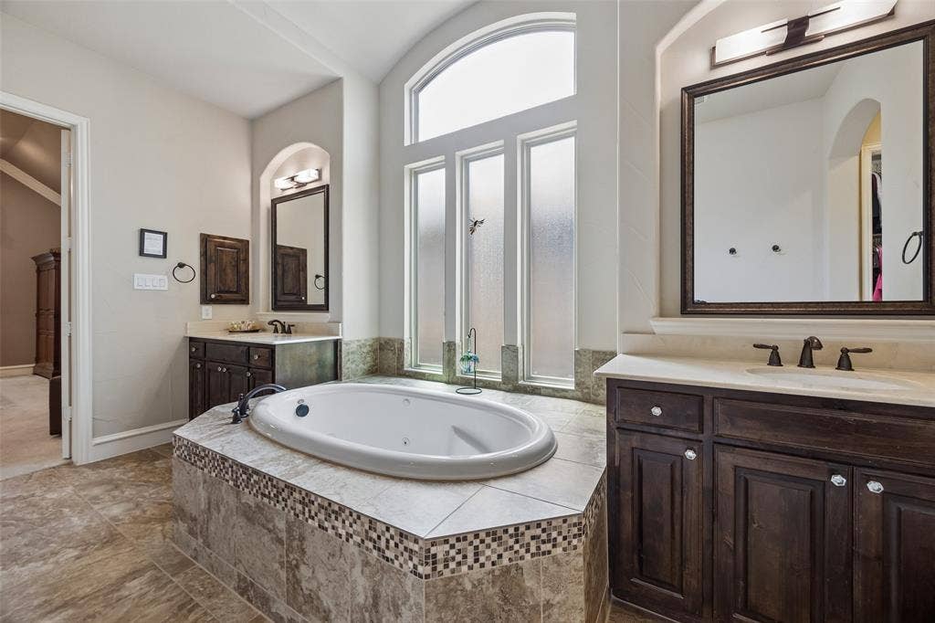 6009 Heron Bay Lane, McKinney, TX 75070 Dual vanities with medicine cabinets.