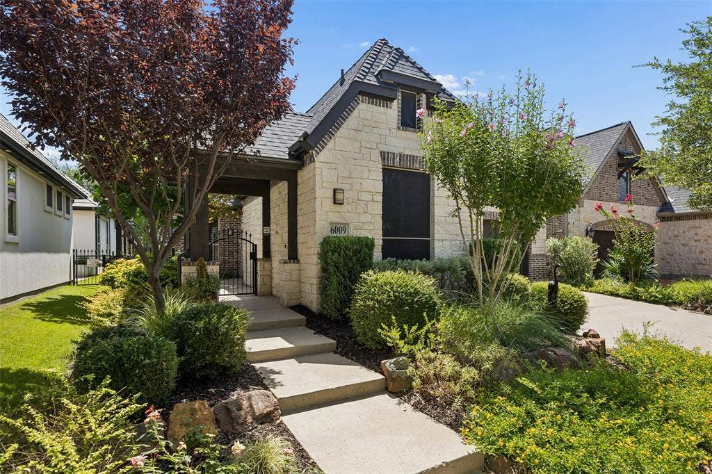 6009 Heron Bay Lane, McKinney, TX 75070 Beautifully landscaped with thoughtful seasonal plantings.