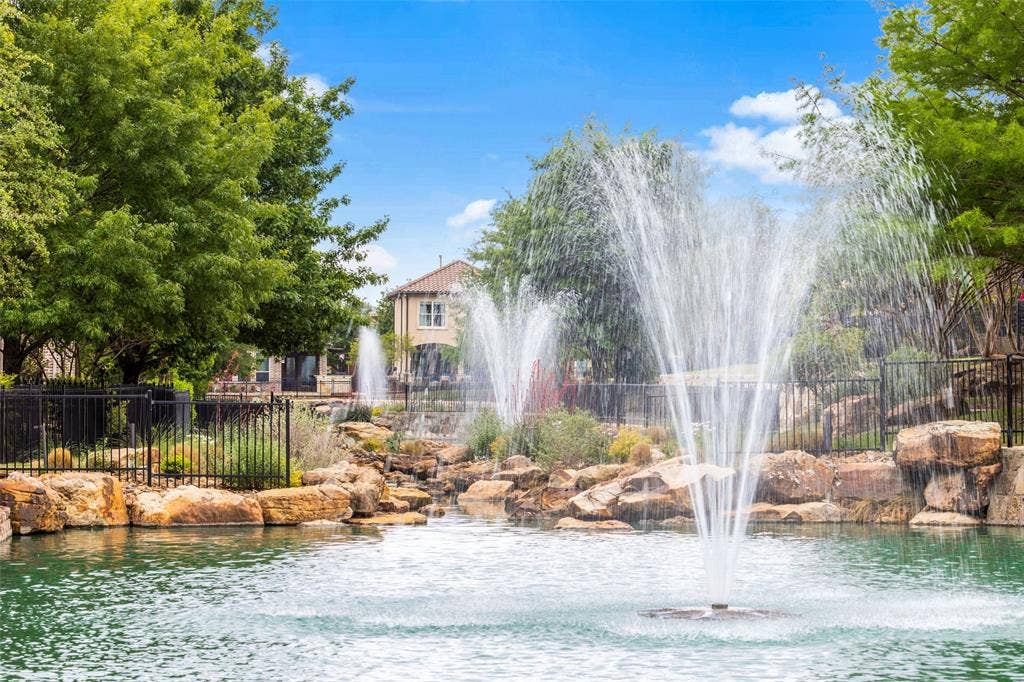 6009 Heron Bay Lane, McKinney, TX 75070 Stacked lighted fountains throughout.