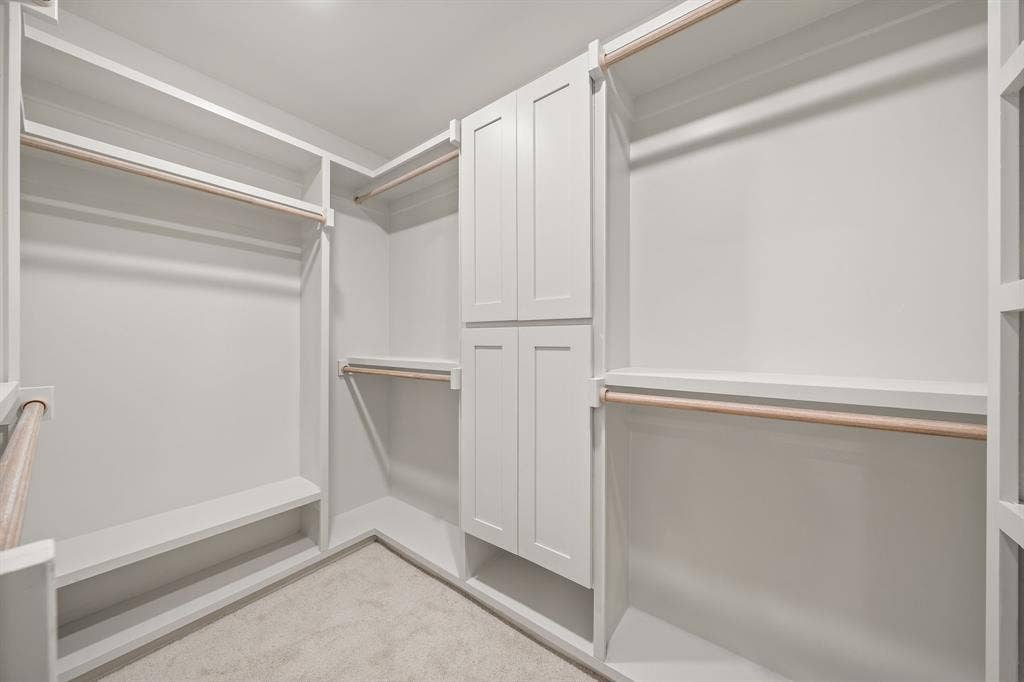 One of three master bedroom closets