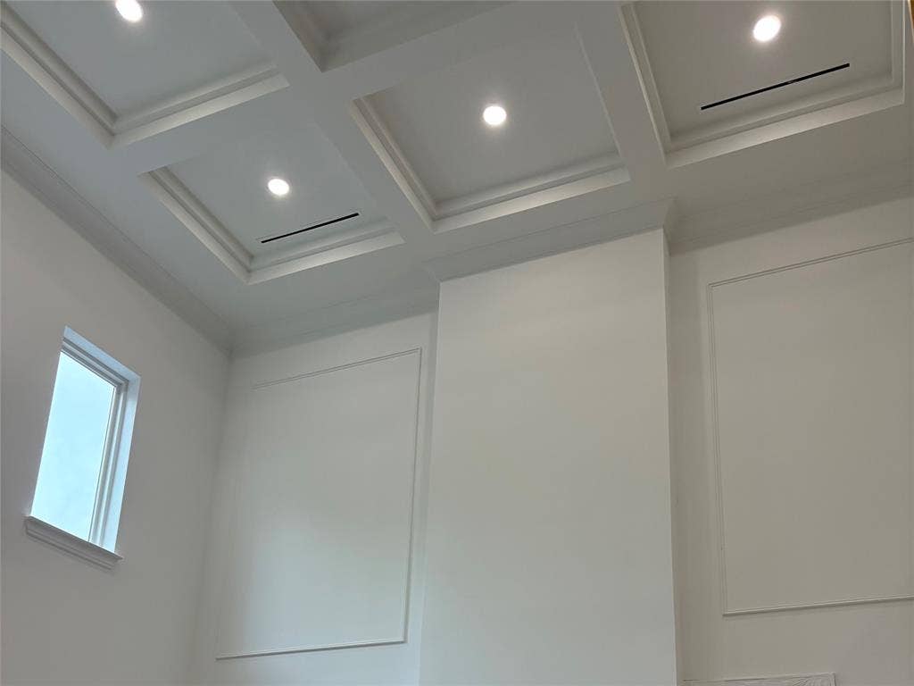 9620 Lakemont Drive, Dallas, TX 75220 Coffered ceiling with recessed lighting, crown molding, and wall paneling
