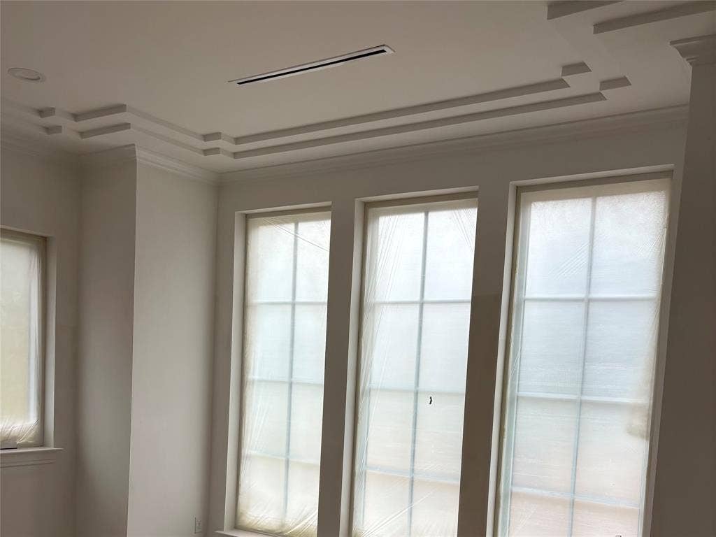 9620 Lakemont Drive, Dallas, TX 75220 Recessed lighting, linear air register, tiered crown molding, and multiple grid windows