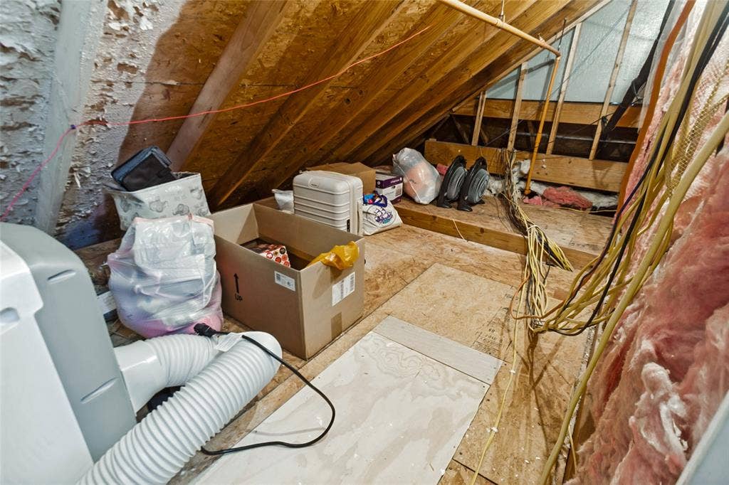 6816 Livorno Lane, Frisco, TX 75034 Walk out attic storage space through secondary bedroom closet