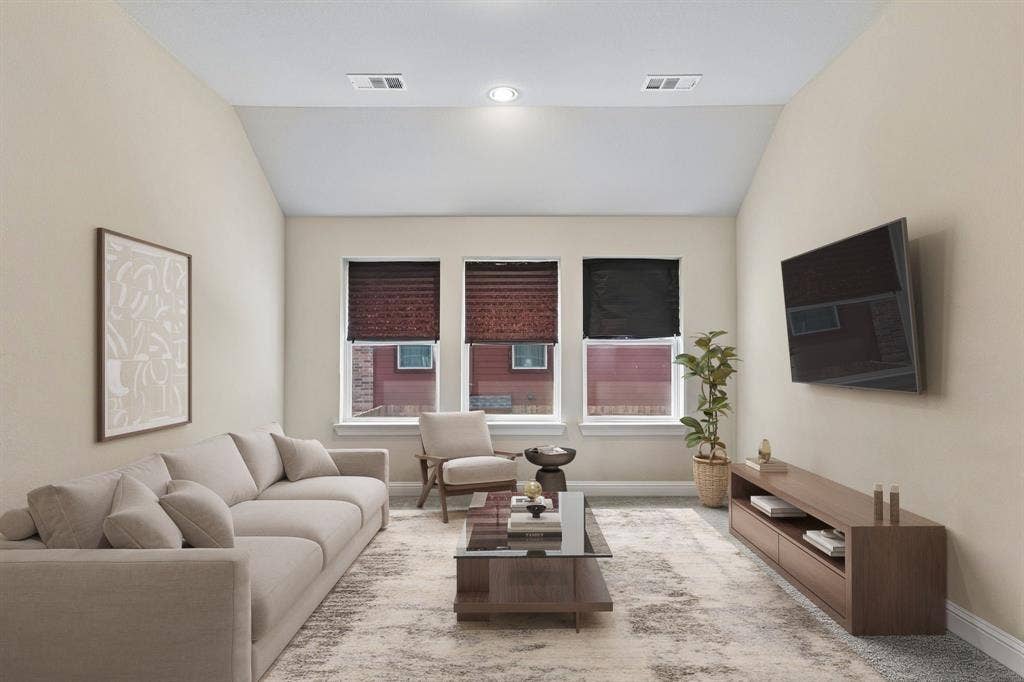 3613 Sparkling Drive, Plano, TX 75074 Vaulted ceiling with recessed lighting, three windows with blinds, and a wall-mounted display