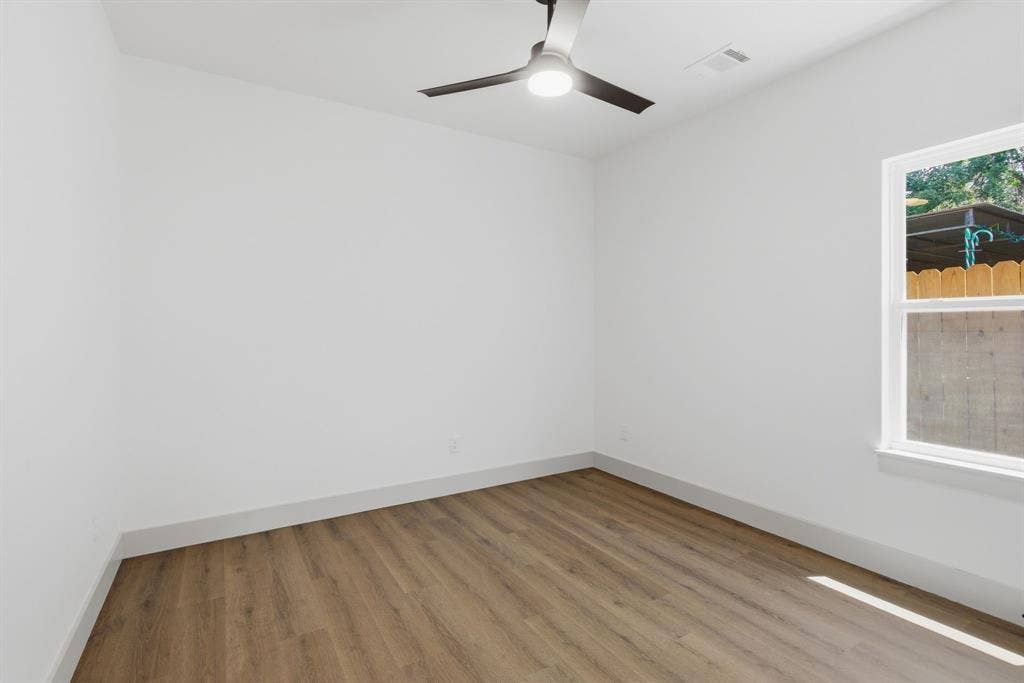 14583 Cherokee Lane, Log Cabin, TX 75148 Recessed lighting, wood-finish flooring, and a contemporary ceiling fan