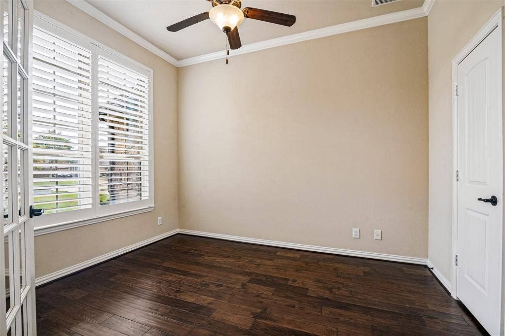 Office is just left of the entry and overlooks the front yard