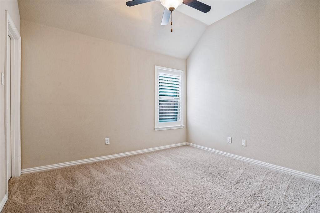 Guest BR 2 with walk in closet and ceiling fan
