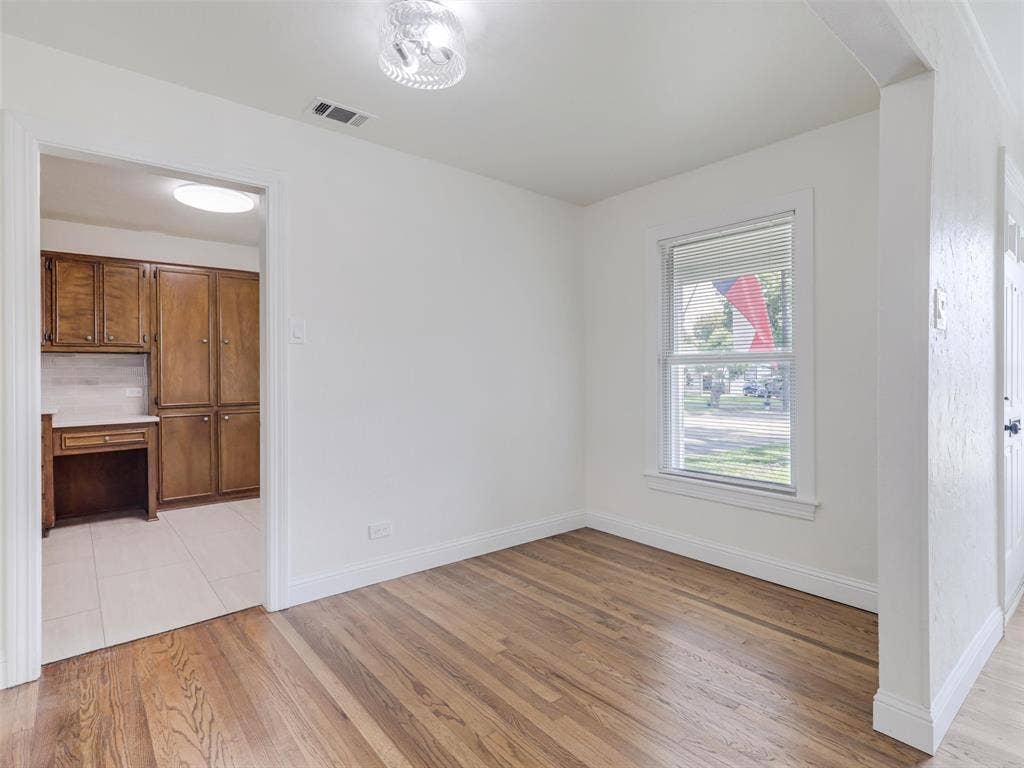 1502 Resistol Road, Garland, TX 75042 Conveniently located between the kitchen and living area.