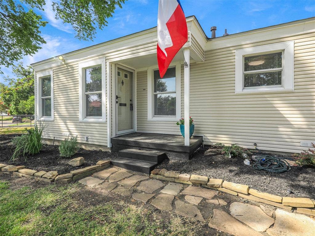 1502 Resistol Road, Garland, TX 75042 Landscaped with stone edging and ready for your custom touch.