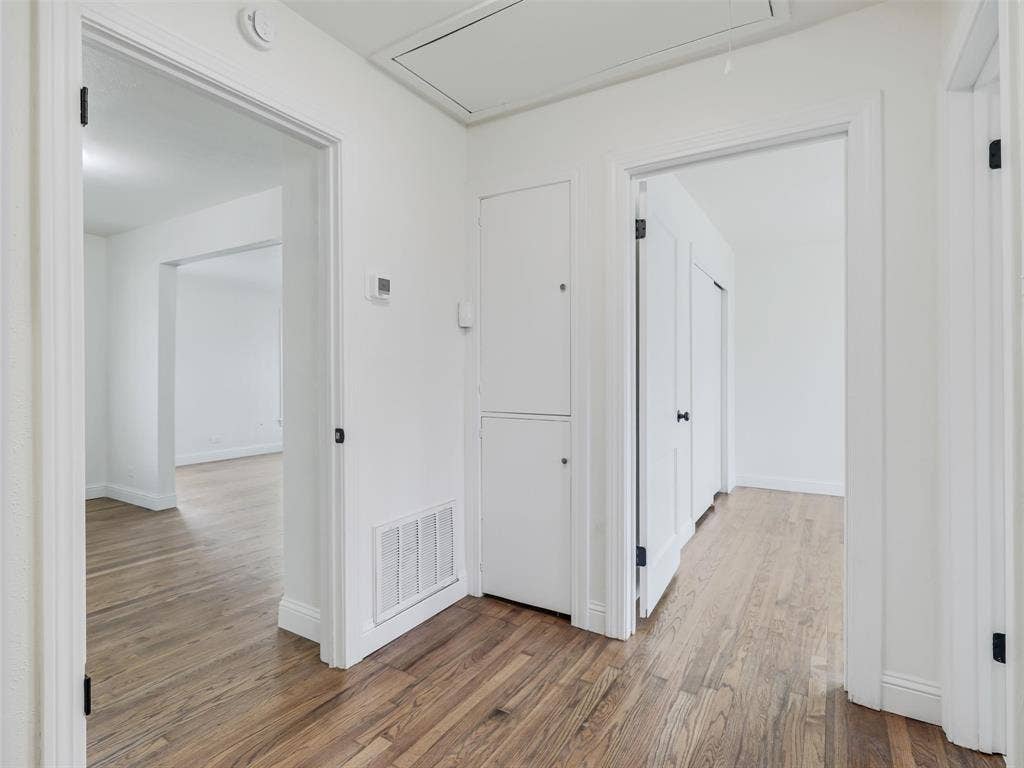 1502 Resistol Road, Garland, TX 75042 Centrally located and includes linen cabinetry and the utility area