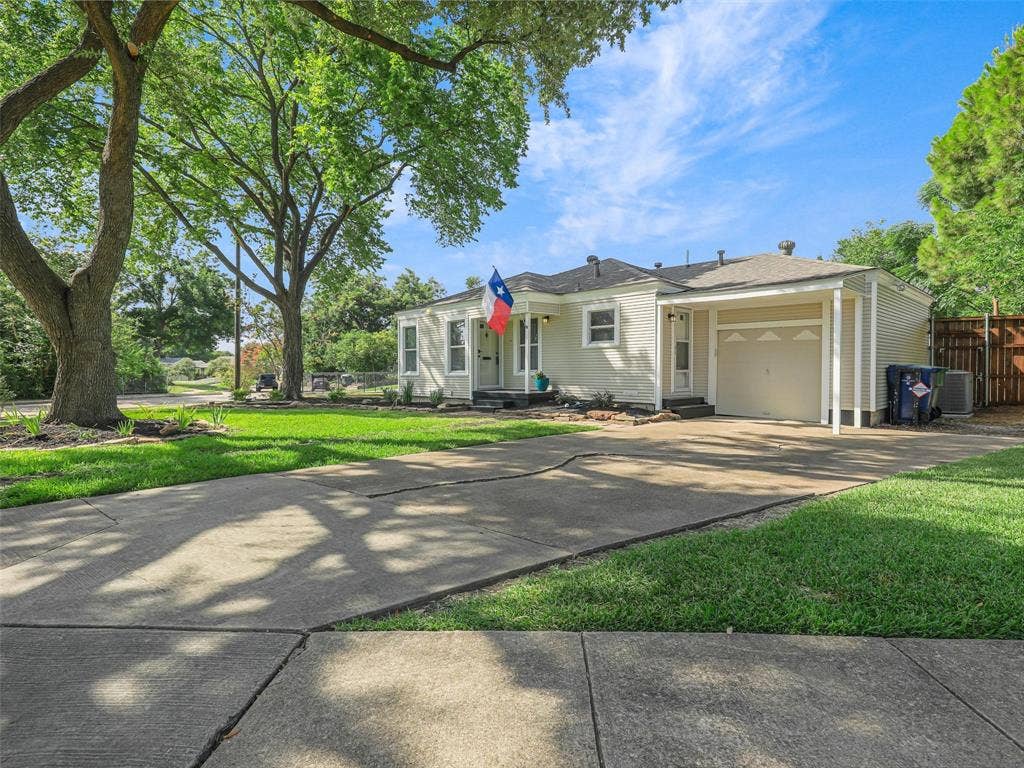 1502 Resistol Road, Garland, TX 75042 Curb appeal with this unique corner lot and wait till you see how this home is packed with features. This is a total package and full of value.