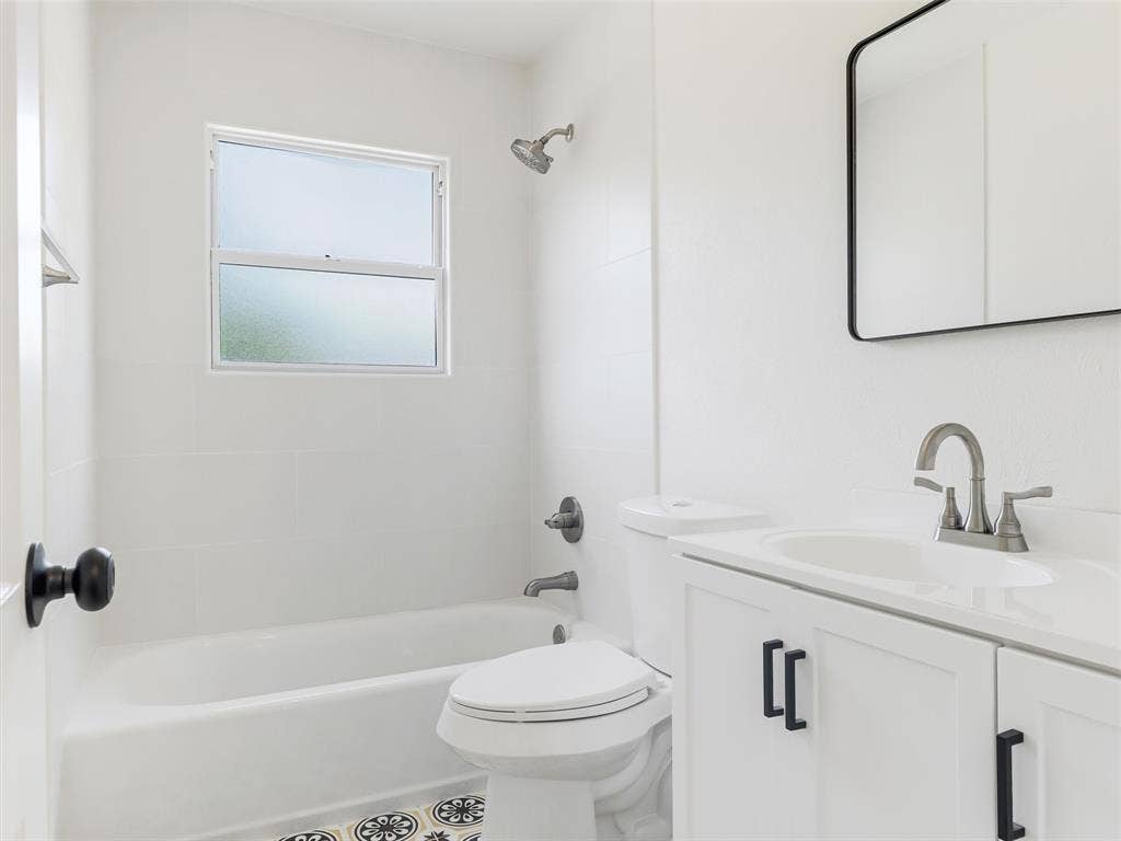 1502 Resistol Road, Garland, TX 75042 Hall bath with gorgeous patterned flooring