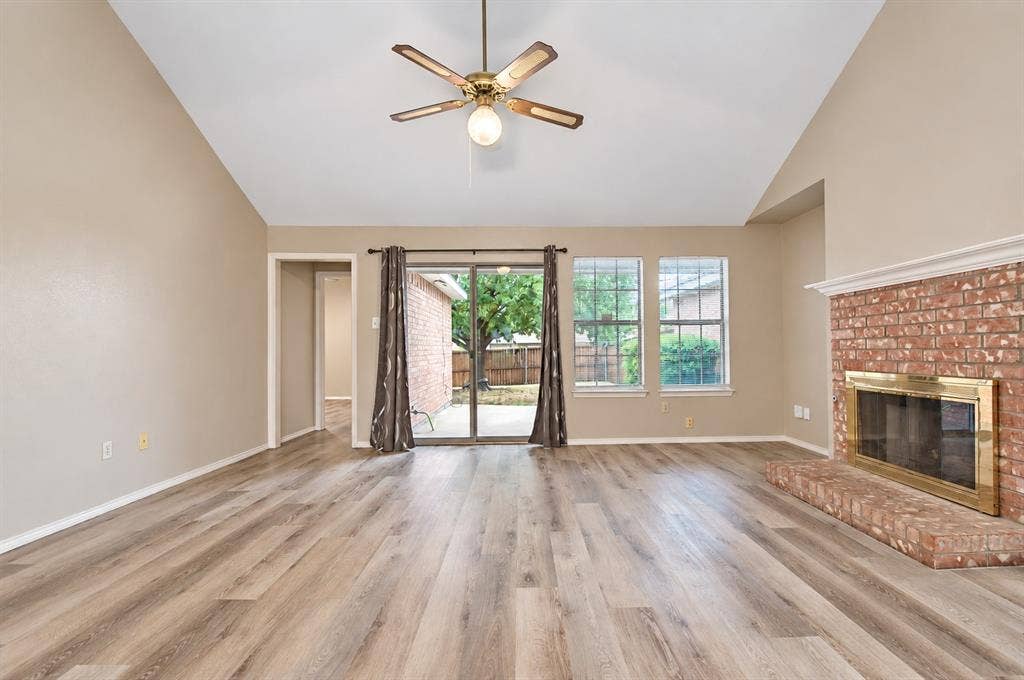2040 Garden Crest Lane, Dallas, TX 75232 Living Room with sliding glass door to back patio