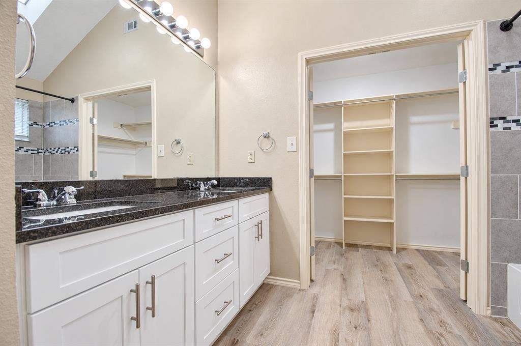 2040 Garden Crest Lane, Dallas, TX 75232 Master bath and closet with granite countertops
