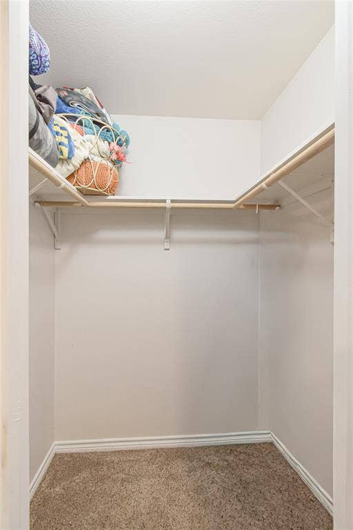 2108 8th Street, Brownwood, TX 76801 L-shaped closet shelving and hanging rods