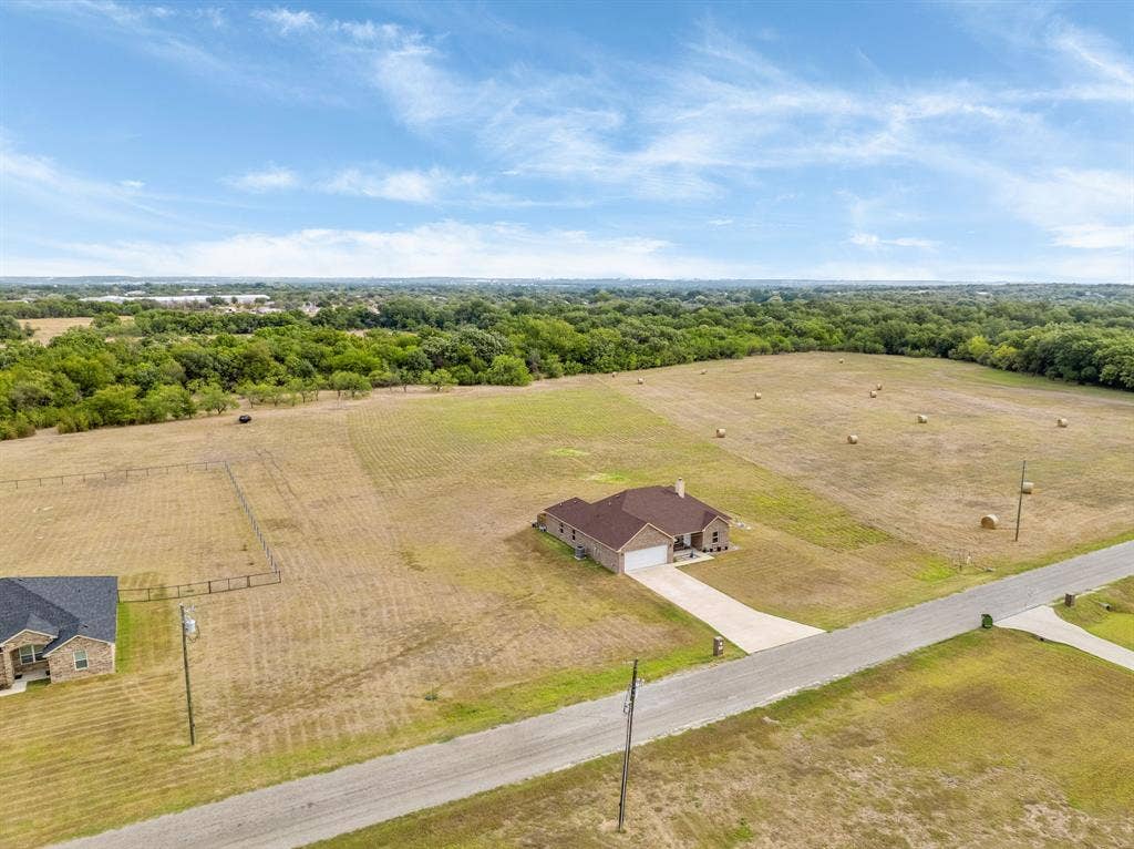 1215 River Hills Road, Stephenville, TX 76401 Drone view of home and acreage