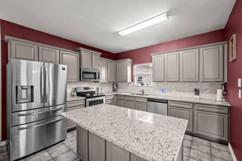 1215 River Hills Road, Stephenville, TX 76401 Kitchen with granite island