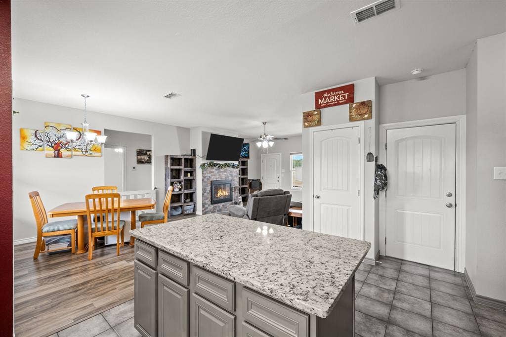1215 River Hills Road, Stephenville, TX 76401 Kitchen island toward dining