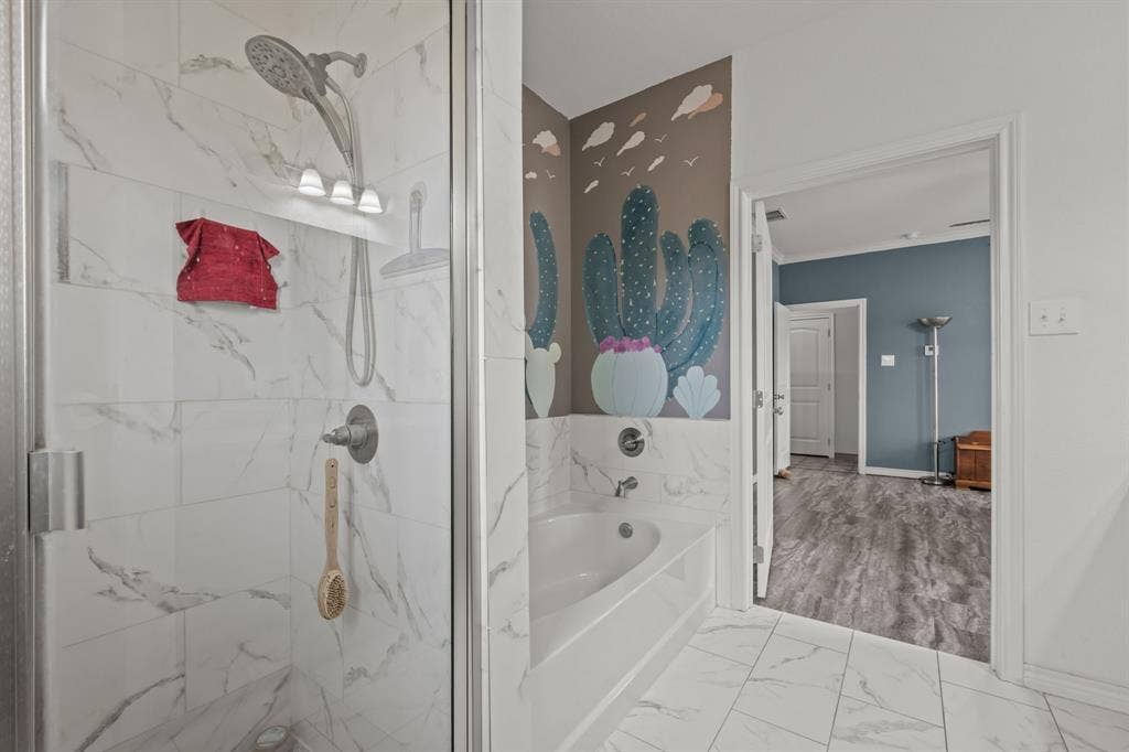 1215 River Hills Road, Stephenville, TX 76401 Primary bath with walk-in shower and tub