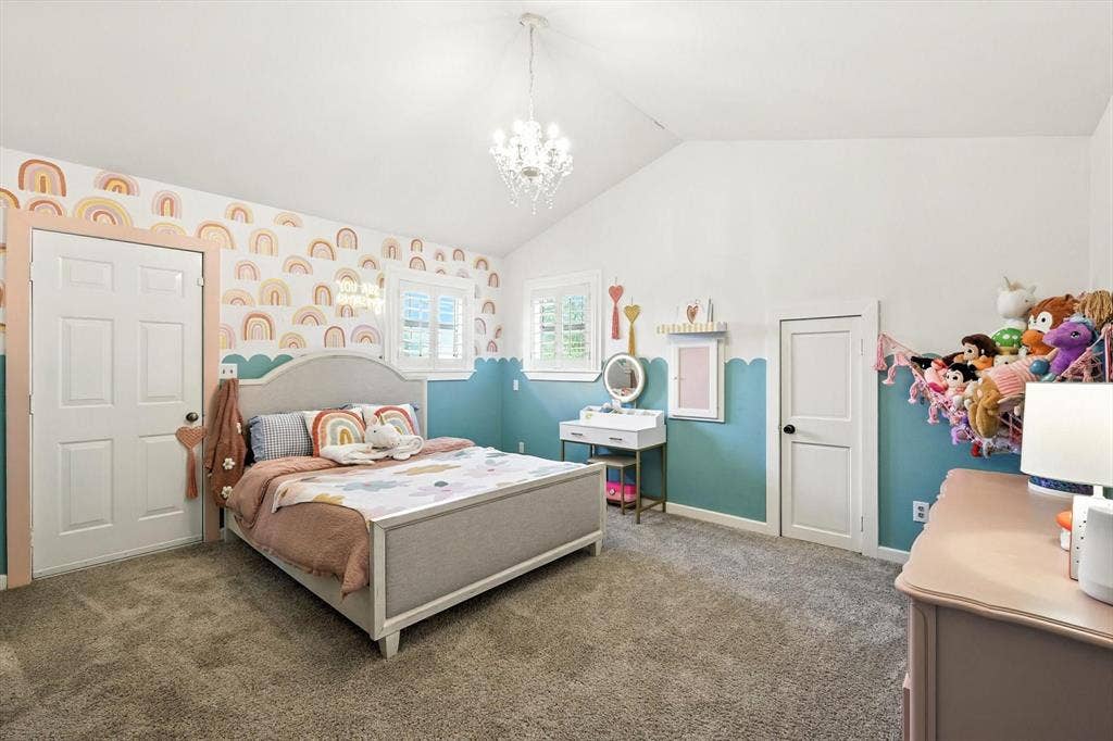 185 Quail Run Court, Decatur, TX 76234 Vaulted ceiling with an attached crystal chandelier