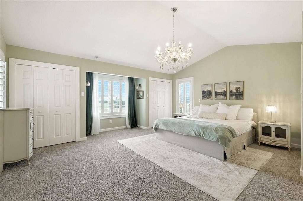 185 Quail Run Court, Decatur, TX 76234 Vaulted ceiling, crystal chandelier, and carpet flooring