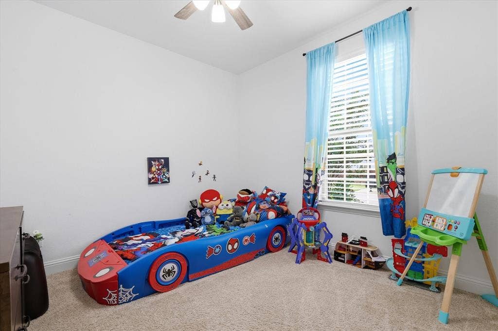 2637 Basswood Drive, Northlake, TX 76226 Carpeted room with a ceiling fan, a window with horizontal blinds, and smooth white walls