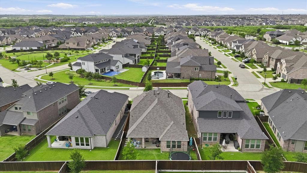 2637 Basswood Drive, Northlake, TX 76226 Expansive residential community featuring a variety of architectural styles, individual fenced yards, paved streets, and abundant green spaces
