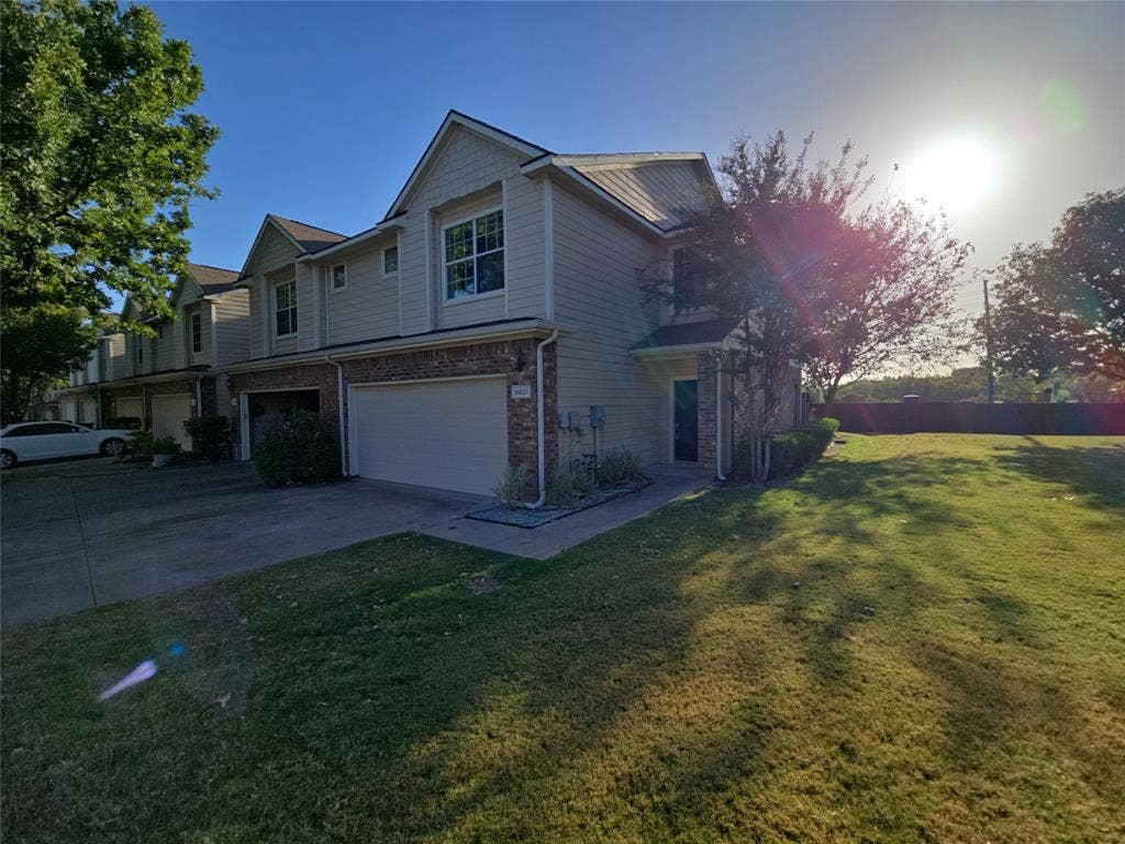 8621 Brunswick Drive, Plano, TX 75024 Two-story exterior with siding and brick detailing