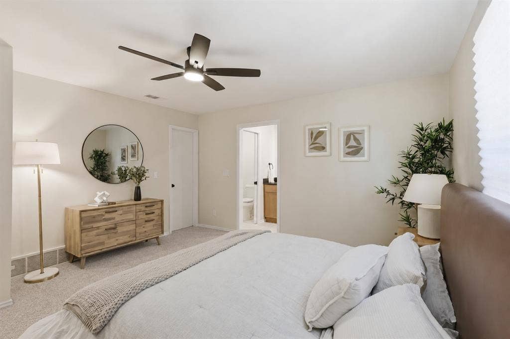1521 Glenwick Drive, Plano, TX 75075 Room featuring neutral wall tones, carpeted flooring, and a ceiling fan with integrated lighting