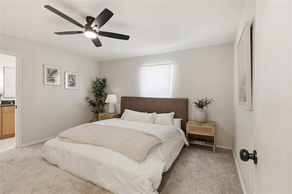 1521 Glenwick Drive, Plano, TX 75075 Neutral-toned interior featuring wall-to-wall carpeting and a multi-blade ceiling fan with integrated lighting