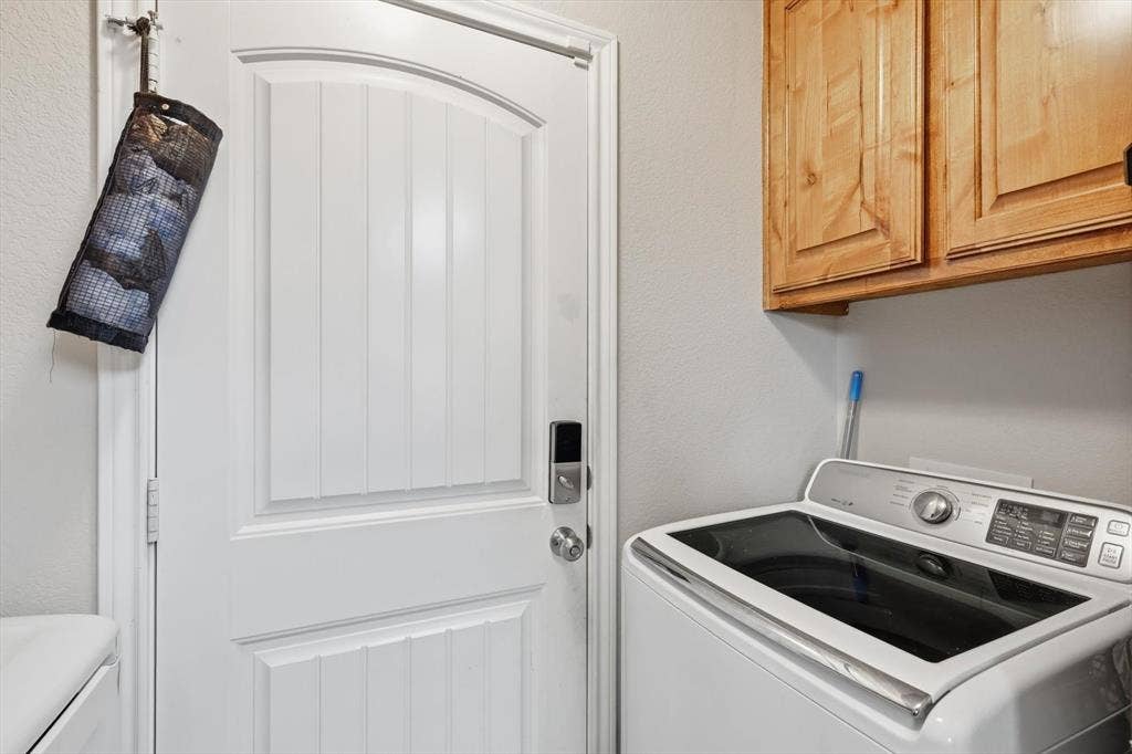 White paneled door with smart lock entry