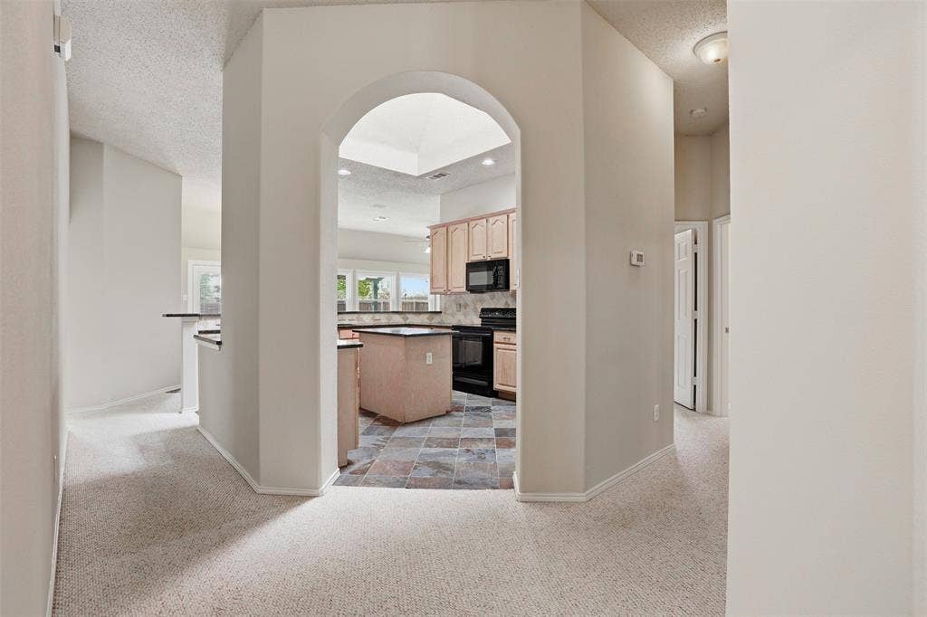 4525 Lodestone Lane, Fort Worth, TX 76123 Arched Entry Into Kitchen