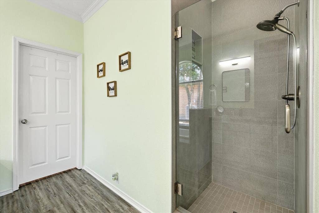 2112 Loon Lake Road, Denton, TX 76210 Walk-in shower with clear glass enclosure and gray tile surround