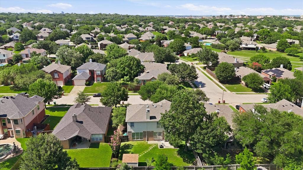 2112 Loon Lake Road, Denton, TX 76210 Residential neighborhood featuring mature trees, paved streets, and a variety of architectural styles