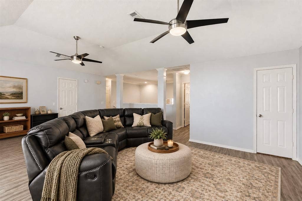2112 Loon Lake Road, Denton, TX 76210 Vaulted ceiling, two contemporary ceiling fans, wood-finish flooring, light-toned walls, and white paneled interior doors