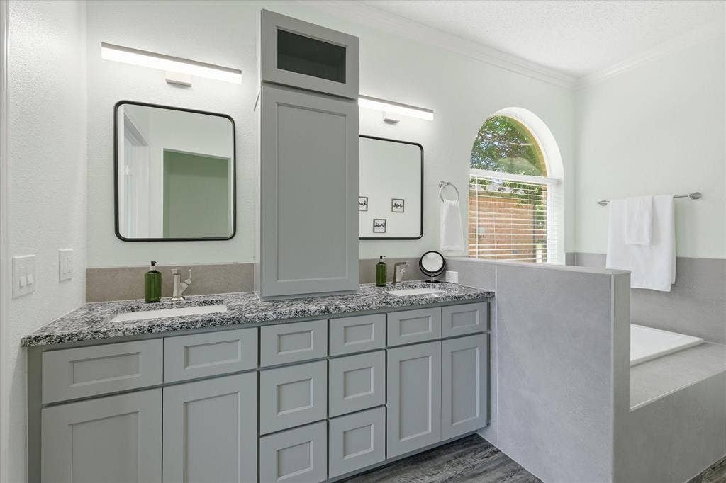 2112 Loon Lake Road, Denton, TX 76210 Dual vanity with light gray cabinetry, built-in storage tower, and stone countertops