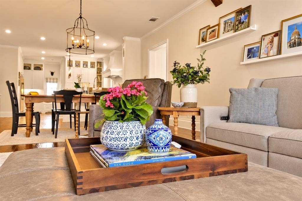 Recessed lighting, wood-finish flooring, and white crown molding