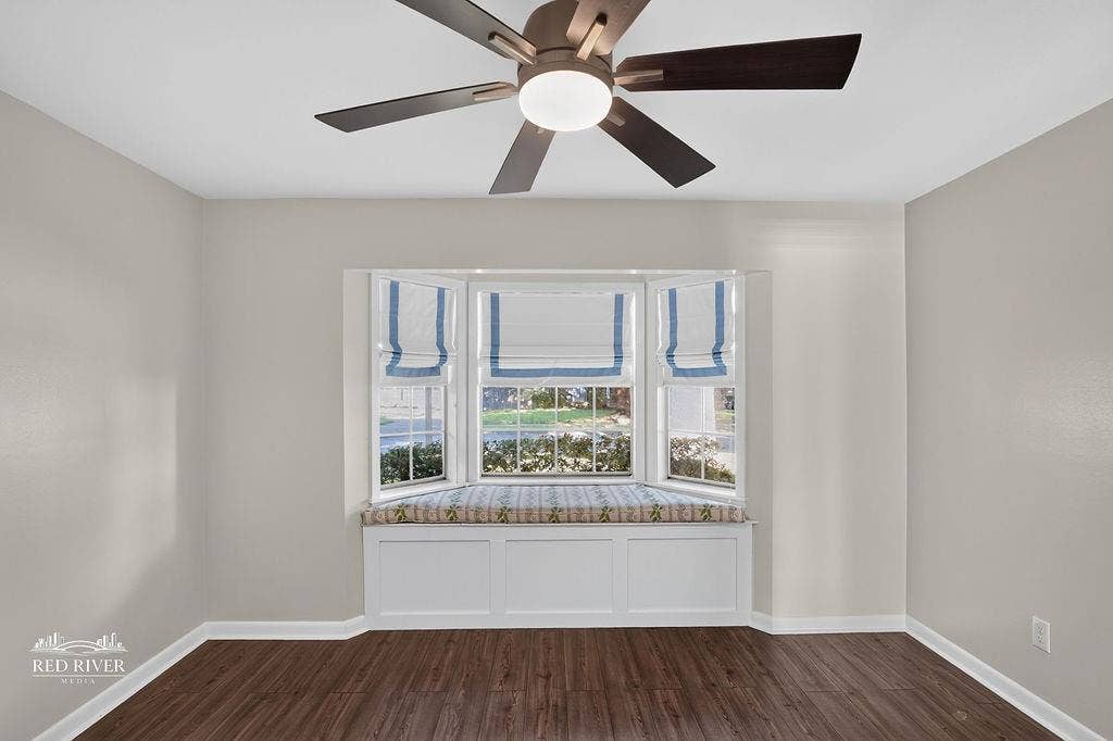 One of three bedrooms