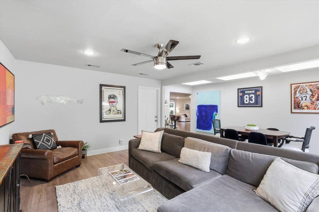 306 W Northgate Drive, Irving, TX 75062 Recessed lighting, wood-finish flooring, and a ceiling fan with integrated lighting