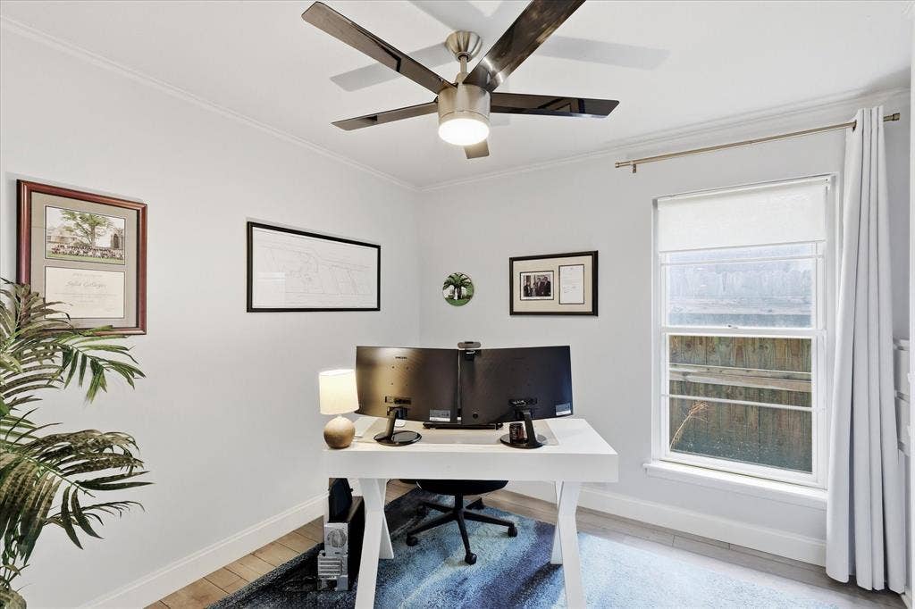 306 W Northgate Drive, Irving, TX 75062 Recessed lighting, a ceiling fan with integrated lighting, and a window with roller shades