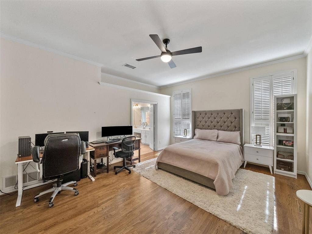 8640 Breakers Point, Dallas, TX 75243 Hardwood flooring, recessed lighting, and crown molding