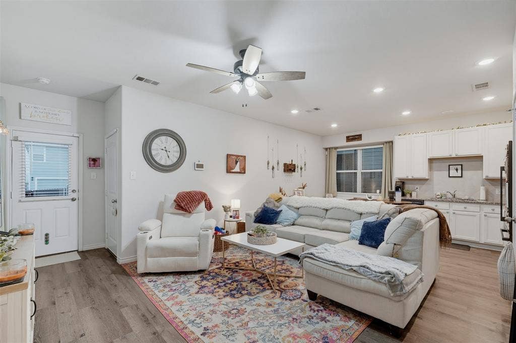 5525 Willamette Drive, Fort Worth, TX 76119 Open-concept living area featuring wood-finish flooring, recessed lighting, and a ceiling fan