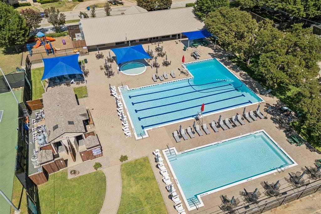 3612 Regent Drive, Dallas, TX 75229 Multiple swimming pools with integrated spa, tennis courts, and a playground